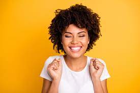 woman excited with fists balled up