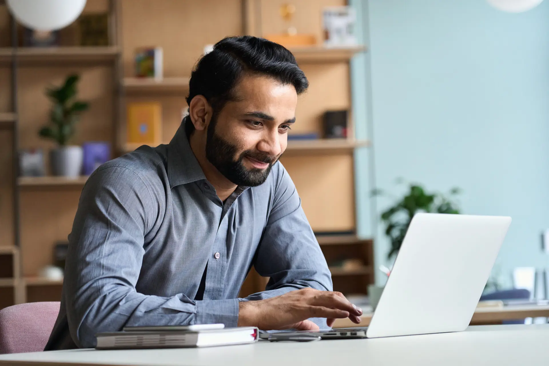 Florida man at home on a secure telehealth video visit with a nurse practitioner