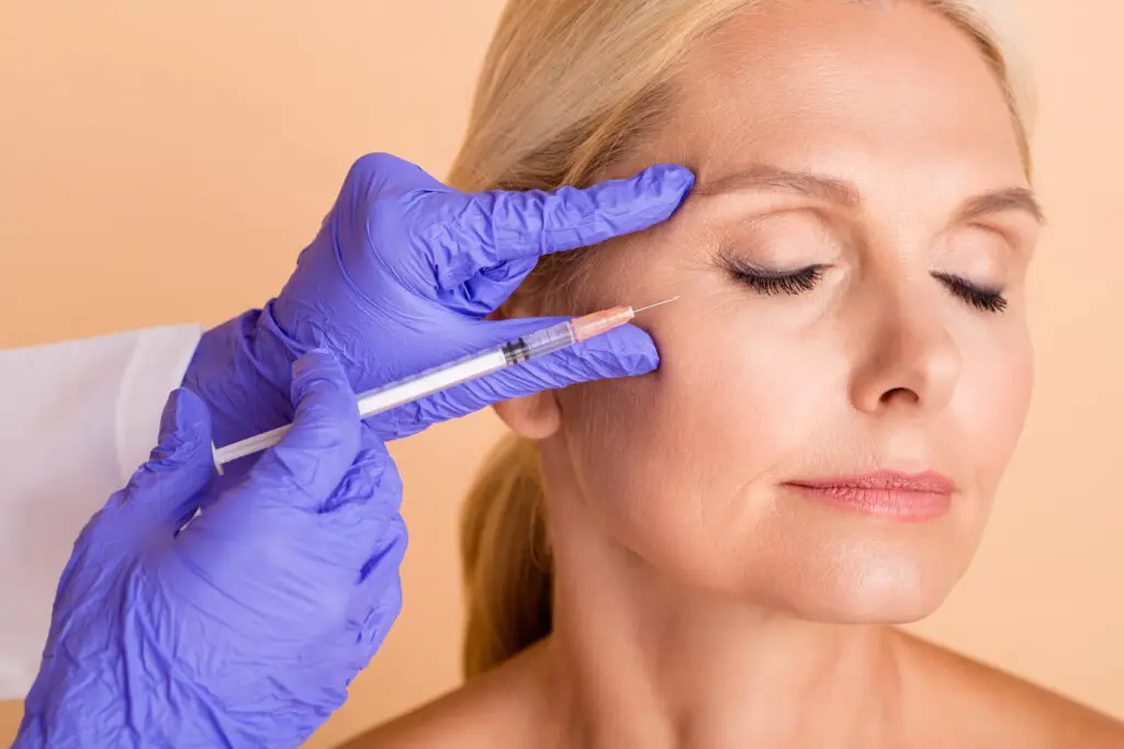 woman getting Xeomin injection in miami Beach FL