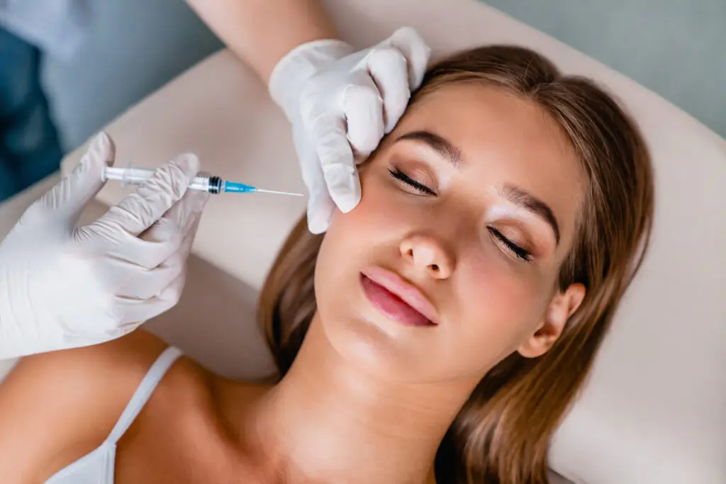 Young woman gets beauty facial injections in a miami beach medspa