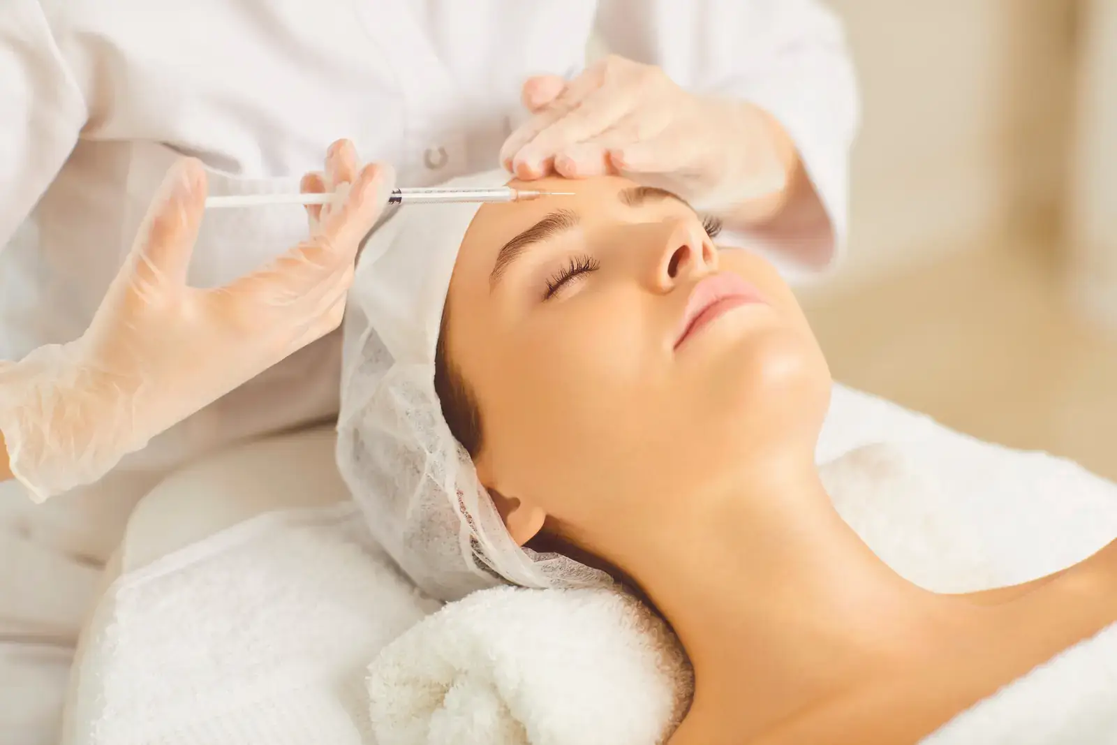 Glabellar lines treatment in Miami Beach - neuromodulator injected into the frown complex between the brows